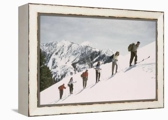 Skiers on the Slopes of Sun Valley Ski Resort, Idaho, April 22, 1947-George Silk-Framed Premier Image Canvas