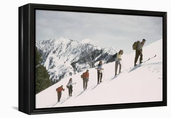 Skiers on the Slopes of Sun Valley Ski Resort, Idaho, April 22, 1947-George Silk-Framed Premier Image Canvas