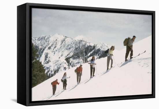 Skiers on the Slopes of Sun Valley Ski Resort, Idaho, April 22, 1947-George Silk-Framed Premier Image Canvas