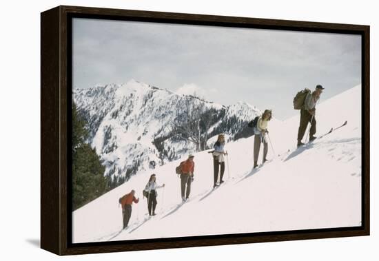 Skiers on the Slopes of Sun Valley Ski Resort, Idaho, April 22, 1947-George Silk-Framed Premier Image Canvas