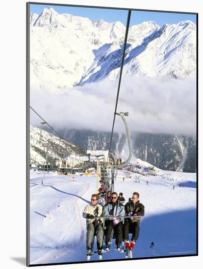 Skiers Riding Chairlift up to Slopes from Village of Solden, Tirol Alps, Tirol, Austria-Richard Nebesky-Mounted Photographic Print