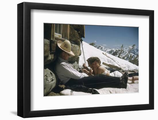 Skiers Smoking, Drinking and Sunbathing at Sun Valley Ski Resort, Idaho, April 22, 1947-George Silk-Framed Photographic Print