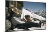 Skiers Smoking, Drinking and Sunbathing at Sun Valley Ski Resort, Idaho, April 22, 1947-George Silk-Mounted Photographic Print
