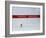 Skiier Arrives at the Finish Line-Paul Sutton-Framed Photographic Print