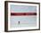 Skiier Arrives at the Finish Line-Paul Sutton-Framed Photographic Print