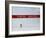 Skiier Arrives at the Finish Line-Paul Sutton-Framed Photographic Print