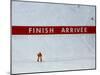 Skiier Arrives at the Finish Line-Paul Sutton-Mounted Photographic Print