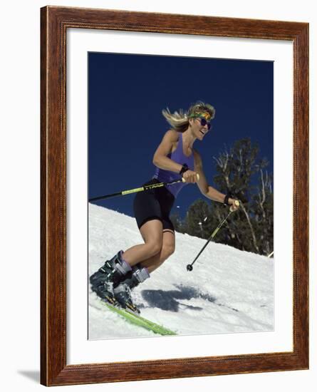 Skiing Downhill in Warm Weather Workout Gear-null-Framed Photographic Print