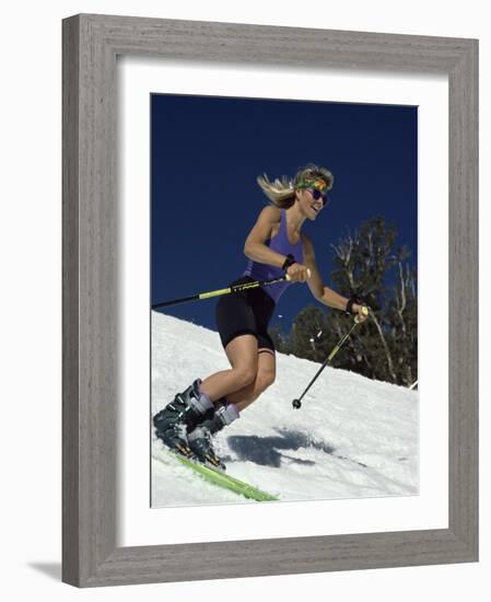 Skiing Downhill in Warm Weather Workout Gear-null-Framed Photographic Print