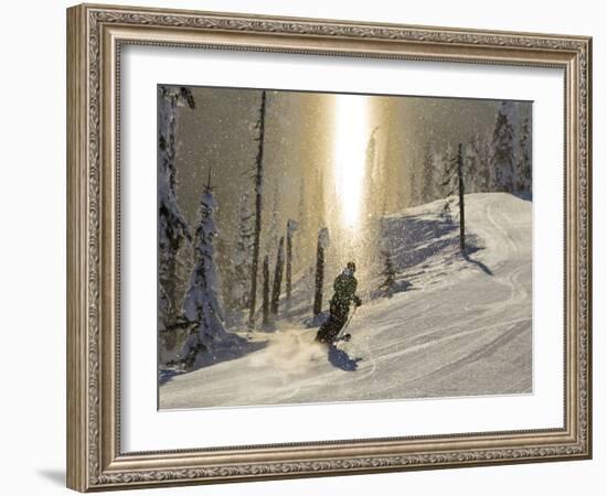 Skiing Through a Sundog on Corduroy Groomed Runs at Whitefish Mountain Resort, Montana, Usa-Chuck Haney-Framed Photographic Print