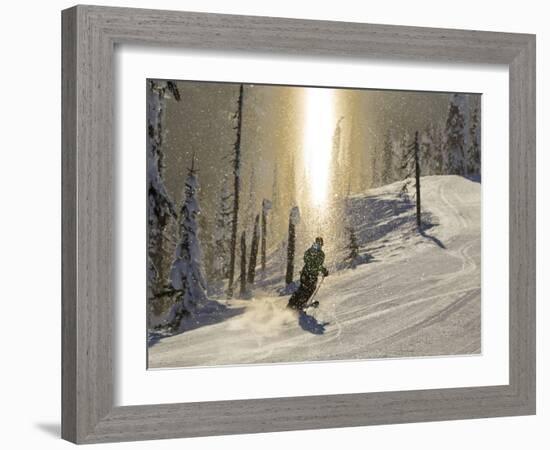 Skiing Through a Sundog on Corduroy Groomed Runs at Whitefish Mountain Resort, Montana, Usa-Chuck Haney-Framed Photographic Print