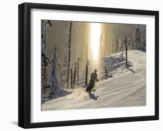 Skiing Through a Sundog on Corduroy Groomed Runs at Whitefish Mountain Resort, Montana, Usa-Chuck Haney-Framed Photographic Print