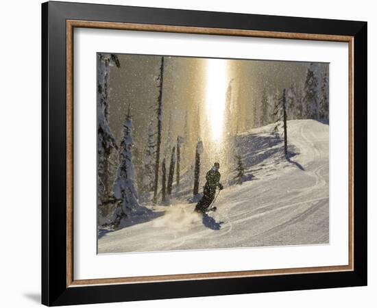 Skiing Through a Sundog on Corduroy Groomed Runs at Whitefish Mountain Resort, Montana, Usa-Chuck Haney-Framed Photographic Print