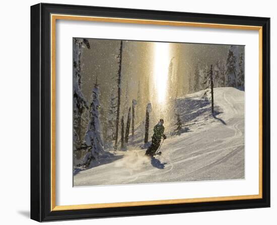 Skiing Through a Sundog on Corduroy Groomed Runs at Whitefish Mountain Resort, Montana, Usa-Chuck Haney-Framed Photographic Print