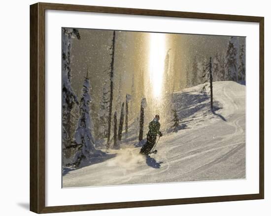 Skiing Through a Sundog on Corduroy Groomed Runs at Whitefish Mountain Resort, Montana, Usa-Chuck Haney-Framed Photographic Print