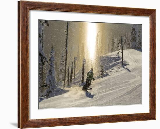 Skiing Through a Sundog on Corduroy Groomed Runs at Whitefish Mountain Resort, Montana, Usa-Chuck Haney-Framed Photographic Print