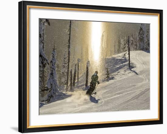 Skiing Through a Sundog on Corduroy Groomed Runs at Whitefish Mountain Resort, Montana, Usa-Chuck Haney-Framed Photographic Print