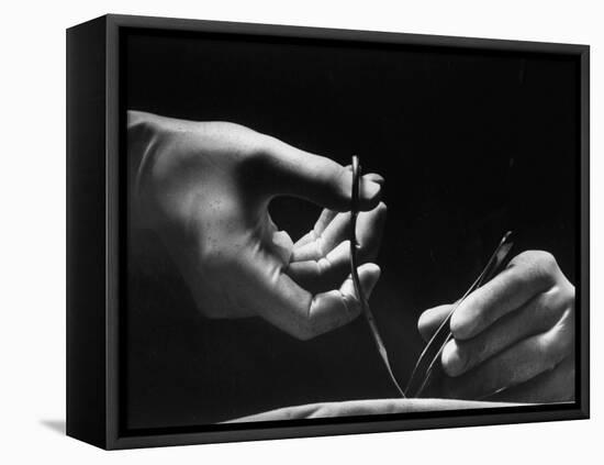 Skilled Hands of a Pediatric Surgeon at John Hopkins Hospital-null-Framed Premier Image Canvas