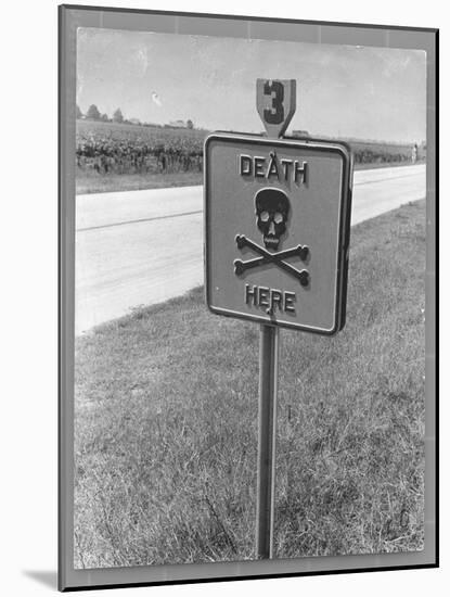 Skull and Crossbones Surrounded by the Words "Death Here" marking fatal car accident-Alfred Eisenstaedt-Mounted Photographic Print