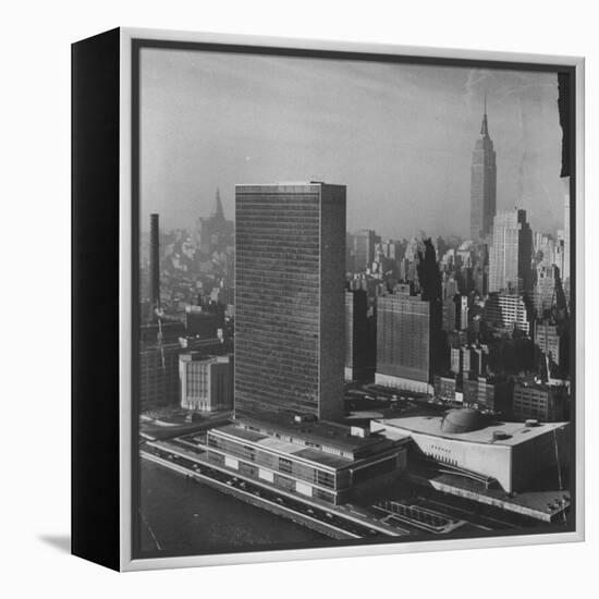 Sky Shot of the Un Headquaters and the Empire State Building-Dmitri Kessel-Framed Premier Image Canvas