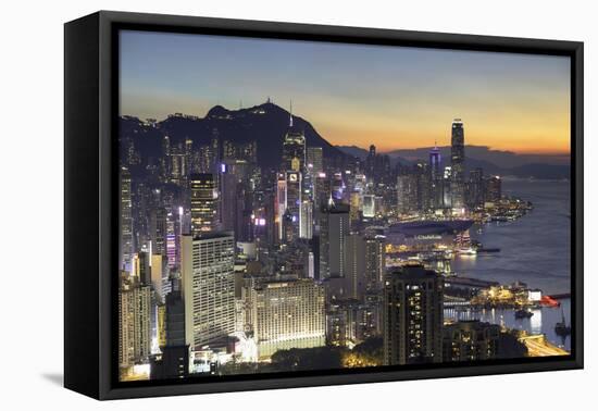 Skyline of Hong Kong Island at sunset, Hong Kong, China-Ian Trower-Framed Premier Image Canvas