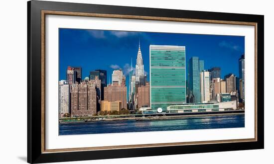 Skyline of Midtown Manhattan seen from the East River showing the Chrysler Building and the Unit...-null-Framed Photographic Print