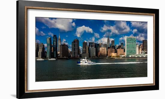 Skyline of Midtown Manhattan seen from the East River showing the Chrysler Building and the Unit...-null-Framed Photographic Print