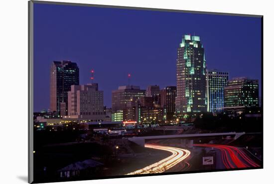 Skyline of Raleigh, NC at night-null-Mounted Photographic Print