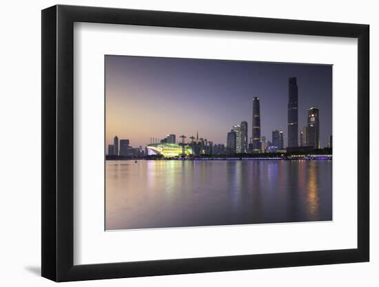 Skyline of Tianhe at dusk, Guangzhou, Guangdong, China, Asia-Ian Trower-Framed Photographic Print