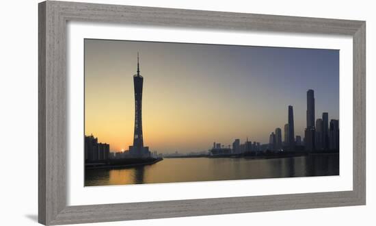 Skyline of Tianhe at sunset, Guangzhou, Guangdong, China, Asia-Ian Trower-Framed Photographic Print