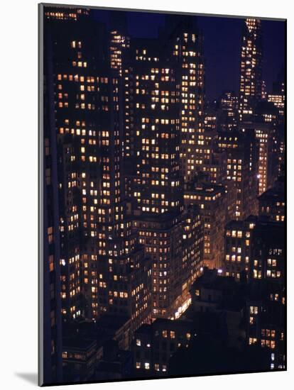 Skyscrapers Lit Up as Evening Descends-Andreas Feininger-Mounted Photographic Print