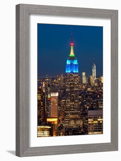 Skyscrapers Lit Up at Night in a City, Empire State Building, Manhattan, New York City-null-Framed Photographic Print