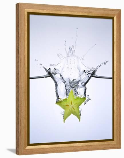 Slice of Carambola Falling into Water-Kröger & Gross-Framed Premier Image Canvas