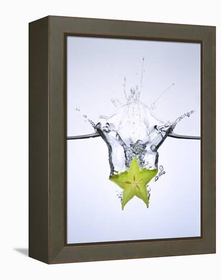 Slice of Carambola Falling into Water-Kröger & Gross-Framed Premier Image Canvas