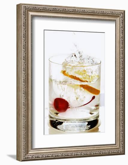 Slice of Lemon Falling into a Drink-Foodcollection-Framed Photographic Print