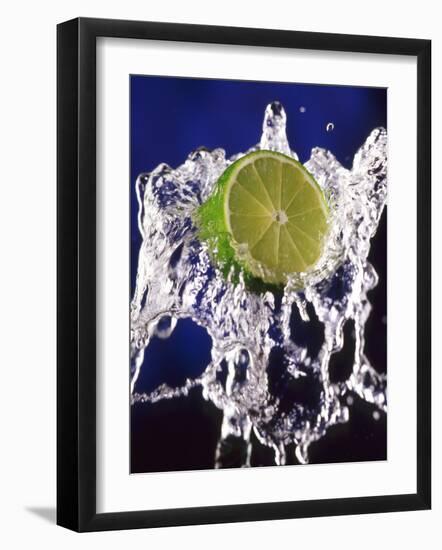 Slice of Lime on Splashing Water-Dirk Olaf Wexel-Framed Photographic Print