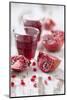Sliced Pomegranates, Seeds and Glass with Pomegranate Juice-Jana Ihle-Mounted Photographic Print