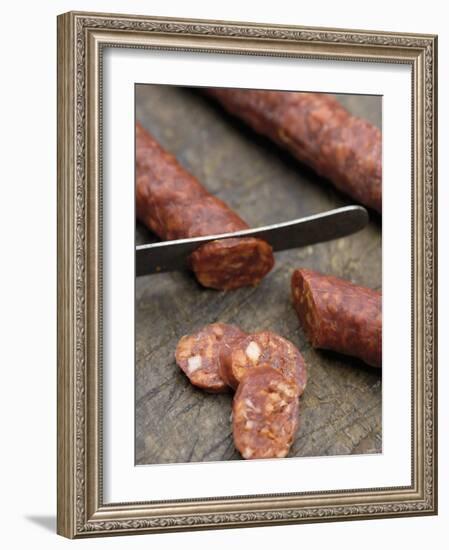 Slicing Chorizo-Winfried Heinze-Framed Photographic Print