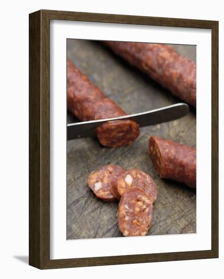 Slicing Chorizo-Winfried Heinze-Framed Photographic Print