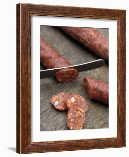 Slicing Chorizo-Winfried Heinze-Framed Photographic Print