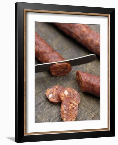 Slicing Chorizo-Winfried Heinze-Framed Photographic Print