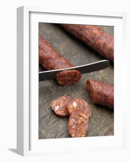 Slicing Chorizo-Winfried Heinze-Framed Photographic Print