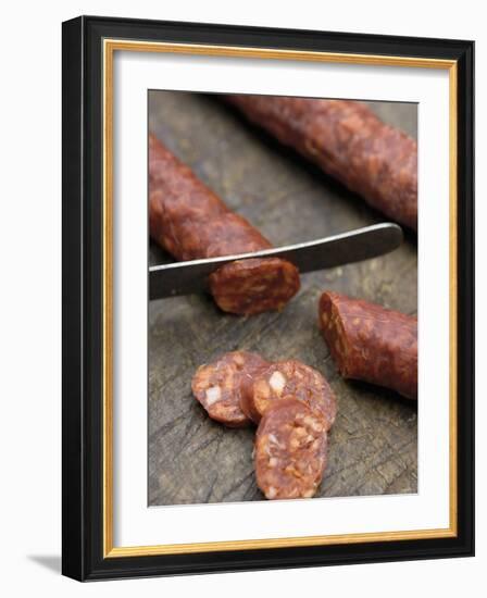 Slicing Chorizo-Winfried Heinze-Framed Photographic Print