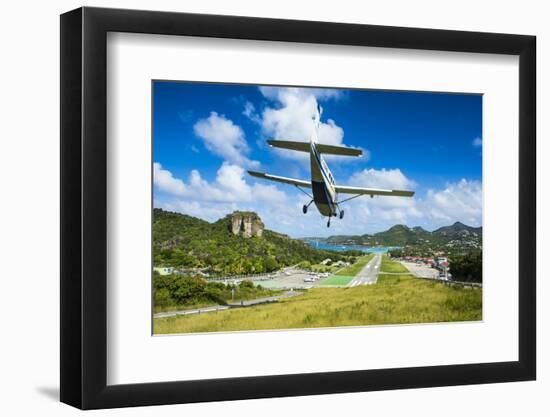 Small airplane landing at the airport of St. Barth (Saint Barthelemy), Lesser Antilles, West Indies-Michael Runkel-Framed Photographic Print