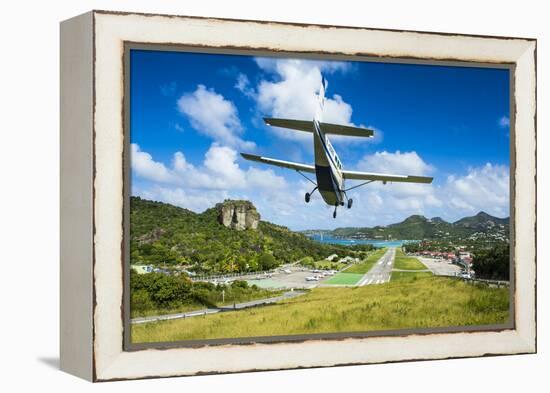 Small airplane landing at the airport of St. Barth (Saint Barthelemy), Lesser Antilles, West Indies-Michael Runkel-Framed Premier Image Canvas