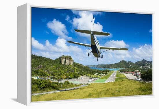 Small airplane landing at the airport of St. Barth (Saint Barthelemy), Lesser Antilles, West Indies-Michael Runkel-Framed Premier Image Canvas