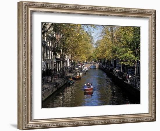 Small Boat on Tree-Lined Oudezijds Achtenburg Wal Canal in the Autumn, Amsterdam, the Netherlands-Richard Nebesky-Framed Photographic Print