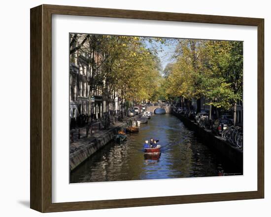 Small Boat on Tree-Lined Oudezijds Achtenburg Wal Canal in the Autumn, Amsterdam, the Netherlands-Richard Nebesky-Framed Photographic Print