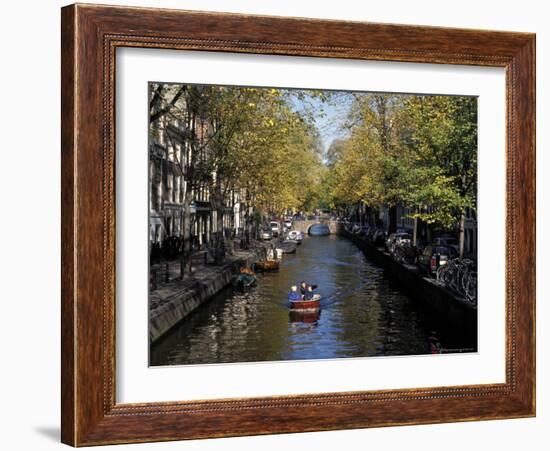 Small Boat on Tree-Lined Oudezijds Achtenburg Wal Canal in the Autumn, Amsterdam, the Netherlands-Richard Nebesky-Framed Photographic Print