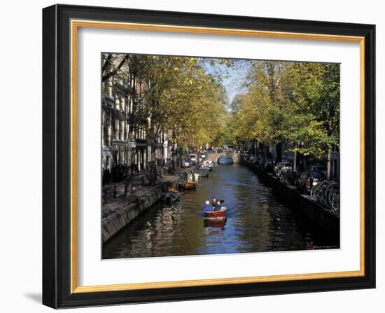 Small Boat on Tree-Lined Oudezijds Achtenburg Wal Canal in the Autumn, Amsterdam, the Netherlands-Richard Nebesky-Framed Photographic Print
